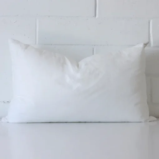 A 30x50 cushion insert inner made with faux feather filling.