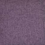Close up image of a plum cushion cover made of soft fabric