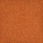 Zoomed in photo of a vivid rust coloured cushion cover in high-quality soft polyester