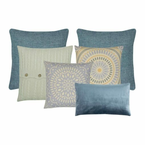 A collection of blue and yellow cushions made in cotton linen, velvet and knit fabric.