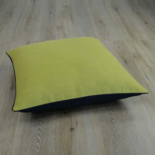 Photo of square, olive and black floor cushion