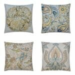 Photo of 4 paisley teal and gold cushion covers with glyph design