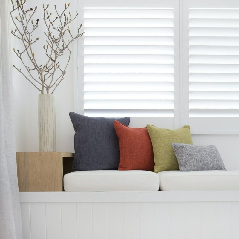 Colourful set of Camden cushions giving colour to a peaceful and calming themed lounge area