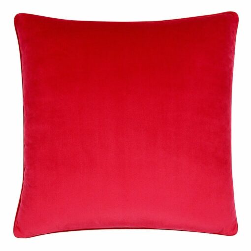 Photo of Cerise red cushion made of velvet material