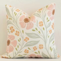 A gorgeous outdoor pink and green square cushion. It has an eye-catching floral design.