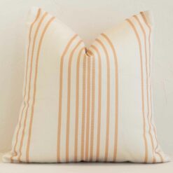 A premium outdoor calaybourne cushion boasting a stripe design and in a square size.