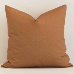 Gorgeous large outdoor cushion cover that has a tan hue. It has a graceful geometric design.