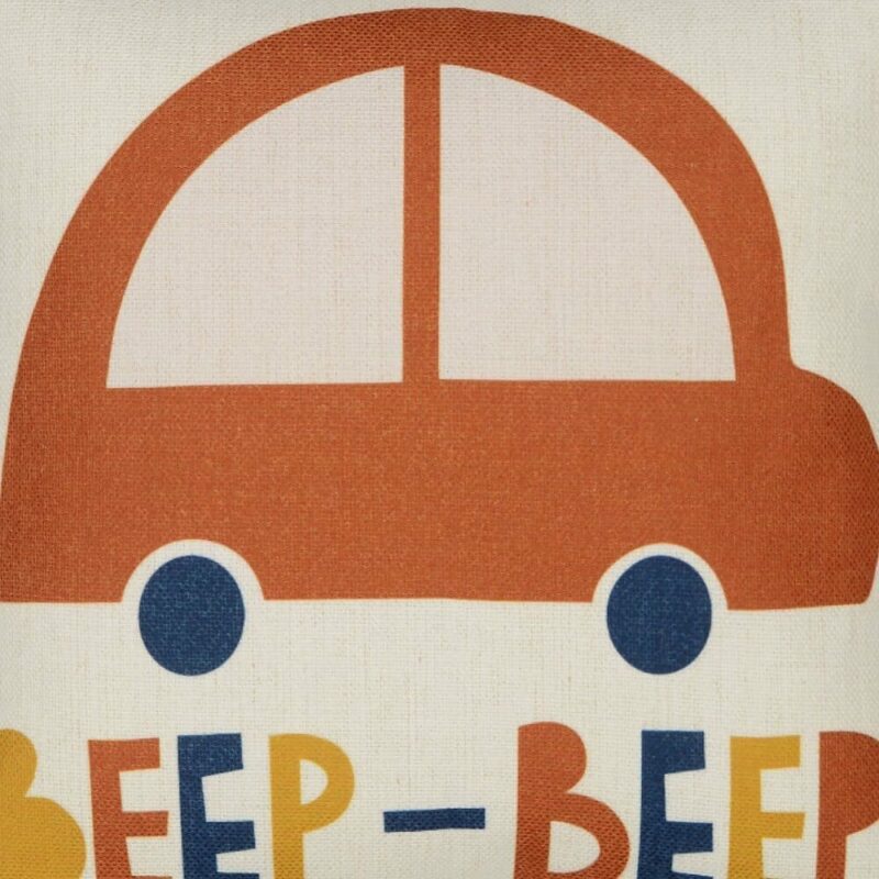Close up image of square kid cushion with cute red car