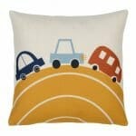Close up photo of cotton linen kids cushion cover with yellow hill, red and blue cars