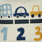Colourful cotton linen kids cushion with blue and yellow cars