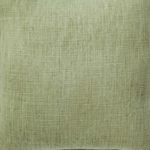 Close up image of cushion cover made of green cotton material