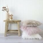 Soft colour themed photo of knit cushion covers also perfect for earthy coloured background