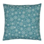 Close up photo of Christmas winter themed cushion with snowflakes