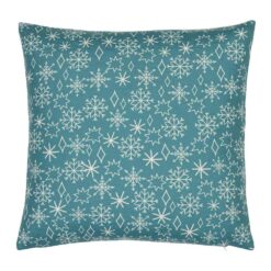 Close up photo of Christmas winter themed cushion with snowflakes