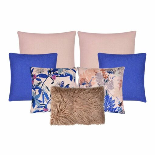 An collection of seven cushion covers in pink and blue colours and floral designs.