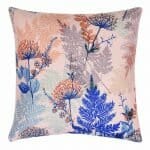 Photo of pink and blue cushion cover with fern design