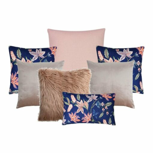A set of seven cushions in pink, rose and blue colours and floral designs.