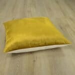 Image of gold mustard floor cushion made of velvet and linen material