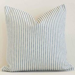 Front view of square cushion. Crafted from a special outdoor material in a blue stripe colour.