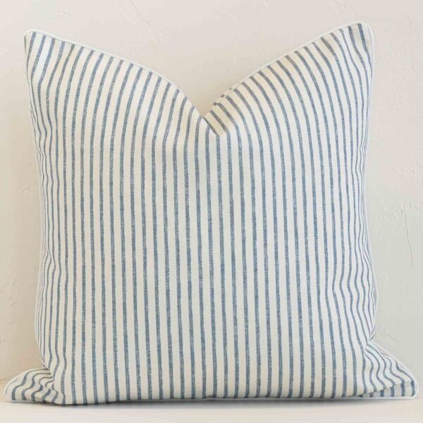 Front view of square cushion. Crafted from a special outdoor material in a blue stripe colour.