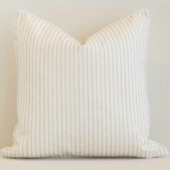 Vibrant sand stripe cushion cover constructed from outdoor fabric and shown in a square size.