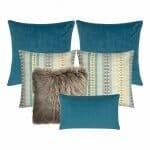 A photo of blue, aqua, grey and brown colours cushion covers in a set of six with five square cushions and one rectangular.