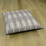 Plush floor cushion cover 70x70 in grey colour with contiguous arrow print