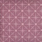 Close up photo of pink water and mould resistant outdoor cushion cover with cross pattern