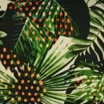 Close up image of jungle inspired outdoor cushion cover made of UV and water resistant fabric