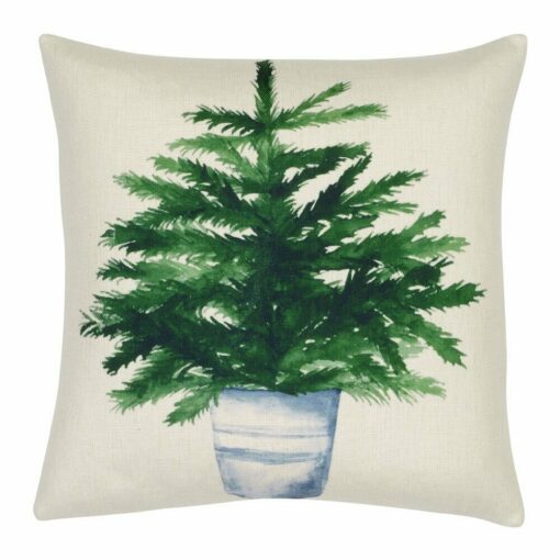 Photo of cute cotton linen cushion with potted green plant