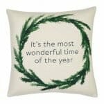 Photo of plain cushion with green Christmas wreath