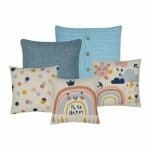 Kids bedroom cushion set in pastel blue and pink colours with polka dots and rainbow print