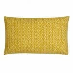 Photo of yellow rectangular cushion cover with dart design