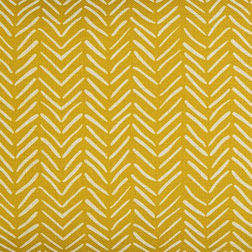 Close up photo of yellow rectangular cushion cover in African tribal print