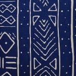 Close up image of Mali inspired blue and white rectangular cushion