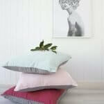 A stack of two-toned floor cushions perfect for a neutral coloured background