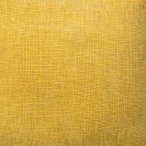 Close up image of mustard yellow cushion cover made of cotton fabric