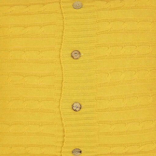 Zoomed photo of bright mustard yellow knit cushion with buttons
