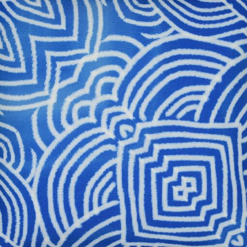 Close up image of Mykonos inspired blue and white cushion cover
