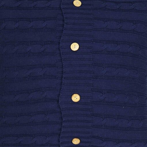 Close up of navy blue knit cushion with buttons
