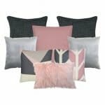A set of eight cushion covers featuring two charcoal cushions, one pink square cushion, two silver cushions, two scandi design pink and grey cushions and a single pink faux fur cushion.
