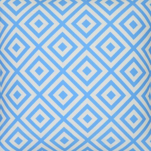 A close up of a bold geometric blue print on a water resistant outdoor cushion cover.