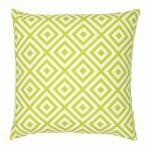 A bold geometric green print on a water resistant outdoor cushion cover.