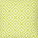 A close up of a bold geometric green print on a water resistant outdoor cushion cover.