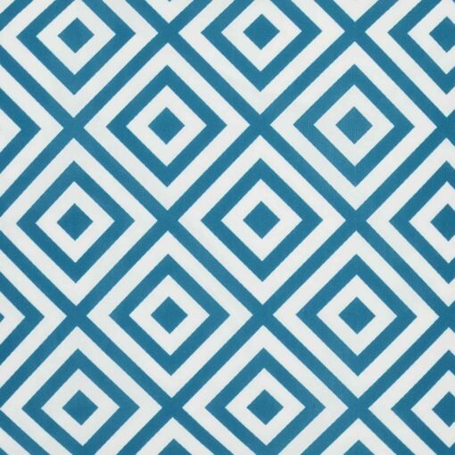 A close up view of a bold geometric teal print on a water resistant outdoor cushion cover.