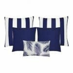 A set of five outdoor cushions in navy colours and striped, plain and botanical designs.