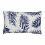 A lovely outdoor cushion with palm tree navy print on a white background.