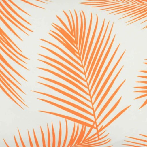 A close up view of a lovely outdoor cushion with palm tree orange print on a white background.