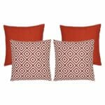 An image of two plain red outdoor cushions and two red geometric design outdoor cushions.