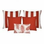 A set of five outdoor cushions in red colours and striped, plain and botanical designs.